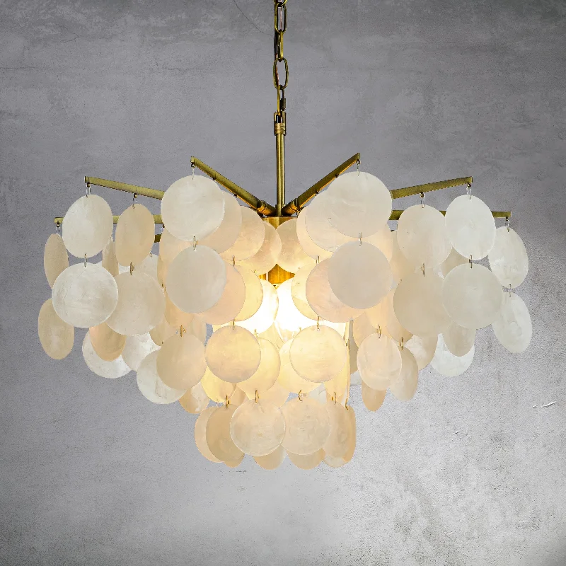 Chandeliers for Living Rooms to Create a Focal PointCraftHome Modern Coastal Tier Capiz Shell Chandelier in Antique Gold
