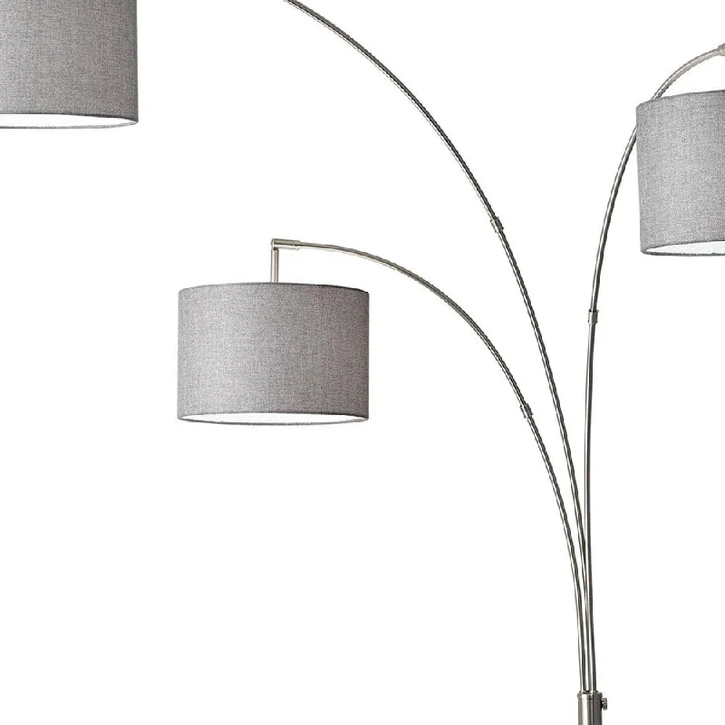Fabric Floor Lamp with a Linen Shade for a Relaxed AestheticThree Light Floor Lamp Brushed Steel Metal Arc Arms Fabric Floor Lamp with a Linen Shade for a Relaxed AestheticThree Light Floor Lamp Brushed Steel Metal Arc Arms
